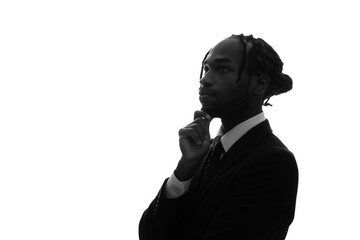 Profile silhouette of a thinking black businessman.