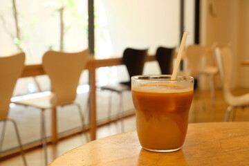 a glass of café au lait in the coffee shop