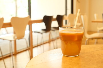 a glass of café au lait in the coffee shop