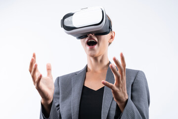 Business woman holding something while wearing VR goggle and standing at white background. Project...