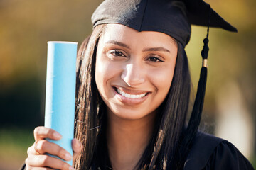 Happy woman, portrait and graduation with certificate for education, scholarship or achievement in nature. Face of young female person, student or graduate with smile for diploma, degree or milestone