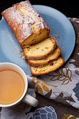 fresh raisin muffin and cup of tea