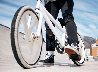 Rider, legs of person and riding bicycle for hobby, daily activity and cycling for fun. Outside,...