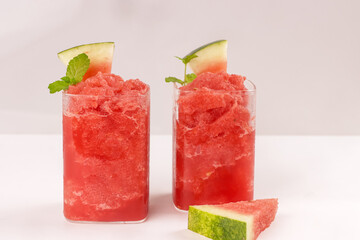 Watermelon Slushie Garnish with Mint and Watermelon Sliced.