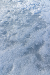 the ice-covered surface of the river in the winter season