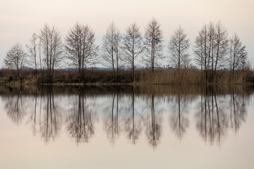 winter sunset on the lake after the ice melts
