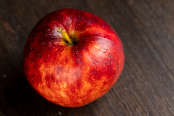 one ripe red apple in close-up