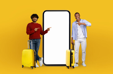 Trendy guys interacting with big phone and luggage
