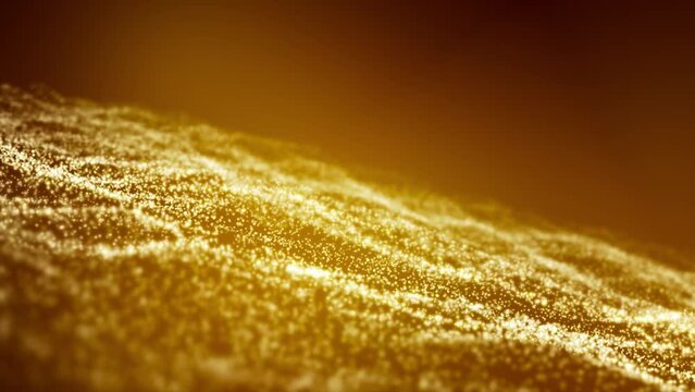 Video animation of golden light shine particles bokeh over golden background - abstract particles background.