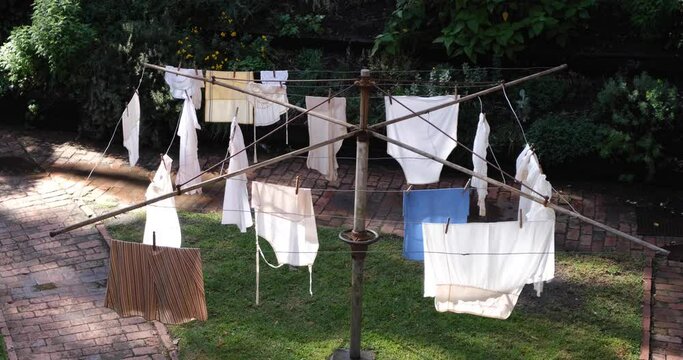 An Australian household icon, the Hills Hoist is a rotary clothesline often seen in Australian backyards, with vintage clothes hanging out to dry in outdoor
