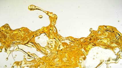 Sunflower Oil Splashing on White Background.