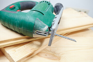 electric fretsaw on a wooden table