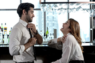 Obraz premium Young sweet couples having a good time in night club bar