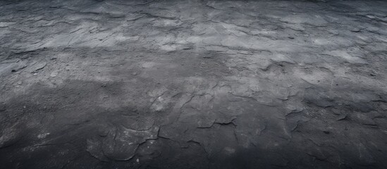 Obraz premium Close up of monochrome image showing textured stone wall