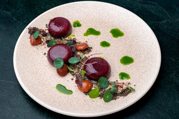 Delectable fine dining beets, marinated to perfection, plated artistically with fresh greens and puree drops.