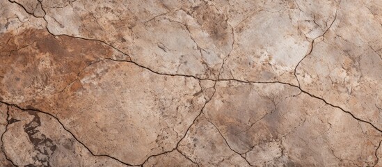 Fototapeta premium Close-up of weathered stone wall with fissures
