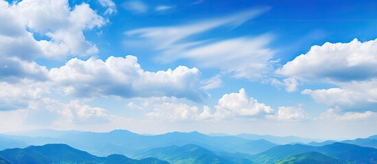 Clouds over distant mountains
