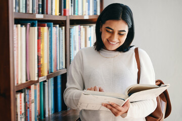 Book, woman and student in library, searching and school with education, novel and knowledge. Happy...