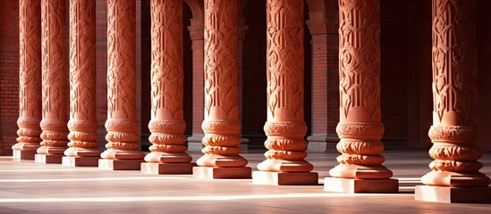 Row of red pillars with columns
