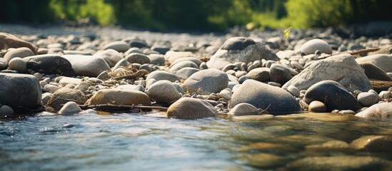River flowing with rocks submerged in water - Powered by Adobe