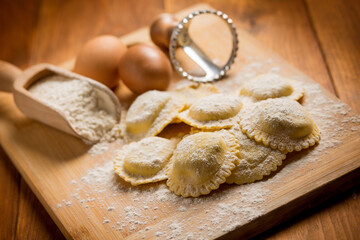 Homemade italian ravioli with flour and eggs