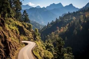 b'Road winding through a mountain valley'