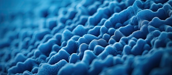 Blue spongy texture with numerous tiny pores