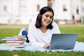 Relax, grass and girl with laptop, headphones and books on campus for research, online project or...