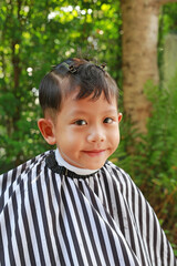 Asian little boy with fashion haircut for a guy. - 793794539