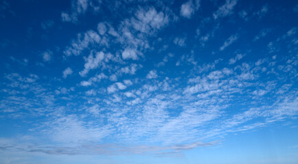 Blue Heaven and white clouds. Sky clouds background. White cloudy on Heaven with soft sun light....