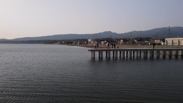 Drone aerial shot, sea, Ayame bridge, Sunset