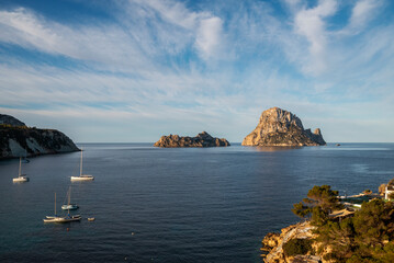 The bay of Cala d Hort bay is a popular destination for sailboats and yachts for its unique view of...