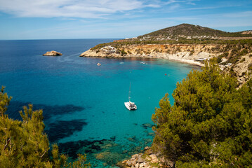 Yachts and sailboats anchored at the beautiful bay of Cala d Hort, Sant Josep de Sa Talaia, Ibiza,...