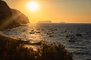 Amazing sunset seascape on Santorini island, scenic view of the Aegean sea, colored sky with sun...