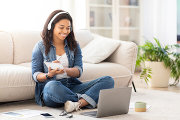 Woman Sitting on Floor Using Laptop, Have Video Lesson
