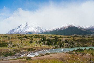 Beautiful landscape view of mountains and a waterfall in Torres del Paine park in Chilean Patagonia
