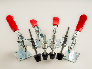 Metal toggle clamps isolated on a white background