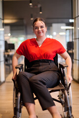 A modern young businesswoman in a wheelchair is surrounded by an inclusive workspace with glass-walled offices, embodying determination and innovation in the business world