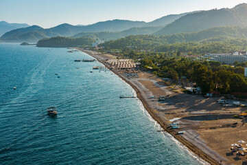 The natural beauty of the Turkish coastline, featuring calm waters, a verdant peninsula, and...
