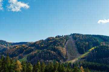A ski slope at Semmering, Austria, in the late winter. Landscape background and wallpaper.