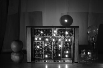 Grungy cardboard model of a vintage synthesizer.Electronic music,performance,music style, instruments concept,black and white, free copy space