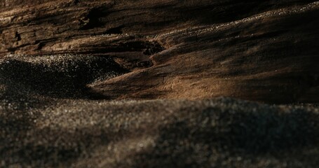 Sand and aged wood texture. Close-up, shallow dof.