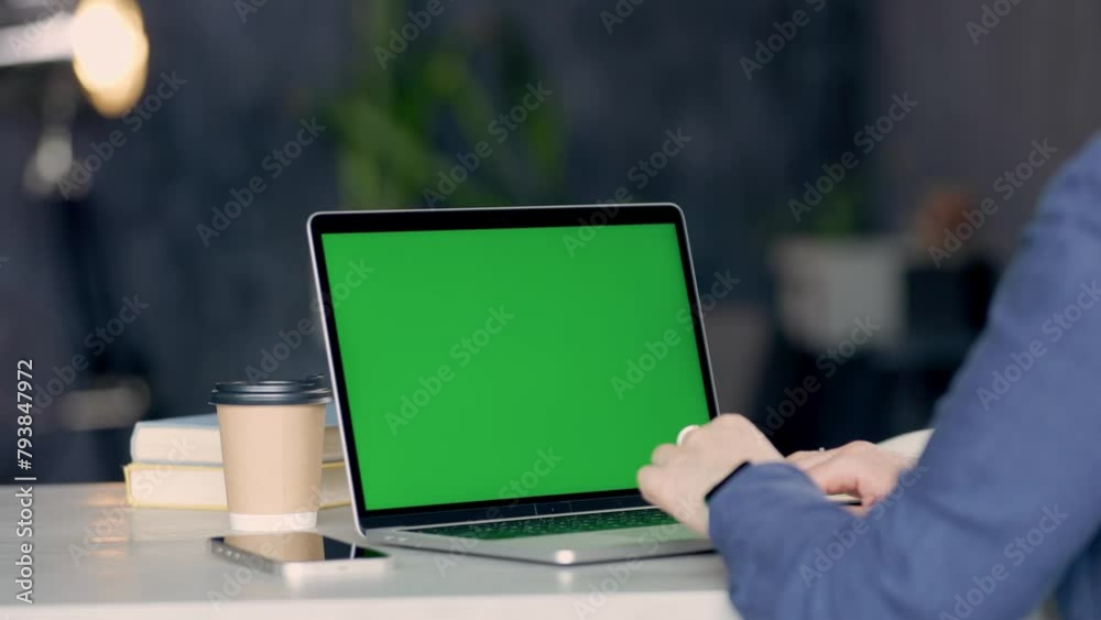 Wall mural close up shot of hands of freelancer working with green screen laptop. chroma key display laptop. wo