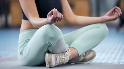  Girl, yoga and meditate in gym for peace, mindfulness and mental health with zen or wellness. Woman, lotus meditation and calm or breathe for spiritual wellbeing in daily routine, workout and closeup © peopleimages.com