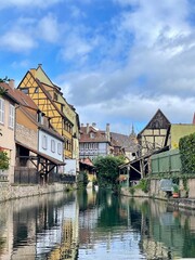 Fototapeta na wymiar Urban medieval landscape of Alsace, water canal Colmar, France. 