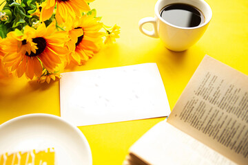 Quarantine concept - flatlay photo with coffee cup, cake, books  and the card with the text Stay Home