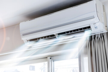 An energy-efficient air conditioner with fresh natural in a modern living room.