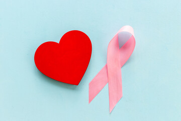 Pink ribbon with heart for world breast cancer day