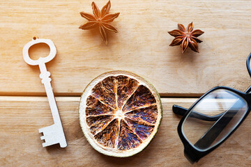 Glasses, fruit and key on wooden background. Stay home concept. Quarantine concept
