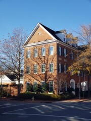 row of residential townhouses. Concept of real estate development, the housing market, and homeownership.